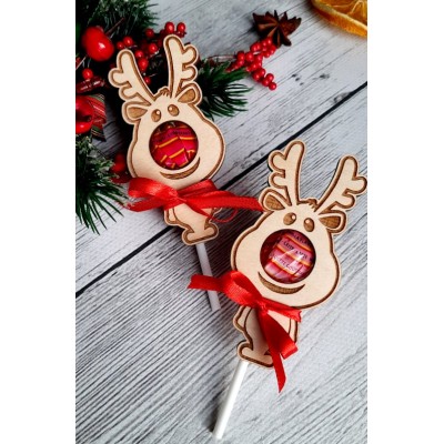 Renifer z miejscem na lizaka